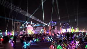 The neon lights of Burning Man's art installations light up the desert