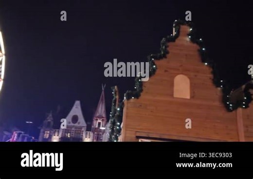 Bethune, France - 23 December 2021: Christmas market in the Grand Place square. The annual event includes wooden chalets and fairytale settings Stock Video Footage - Alamy