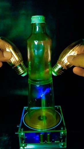 Tesla Coil ⚡ + Glass bottle 🍾 + Glass 🥛 + light bulb 💡 #teslacoil #experiment #highvoltage