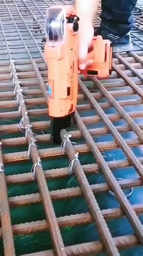Construction Worker In Action: Drilling Rebar for Safety