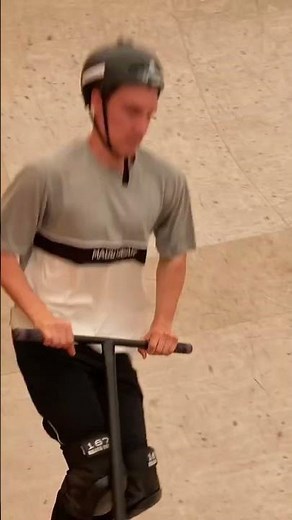 Scooter tricks in a Mini ramp