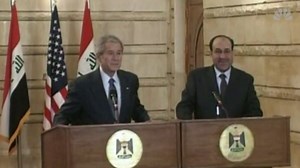 Iraqi journalist Muntazer Zaidi throws shoe at President George W. Bush