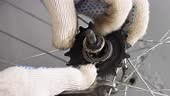 Maintenance and repair of the bike. Closeup disassembly of the rear...