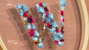 Sticken mit getrockneten Blüten