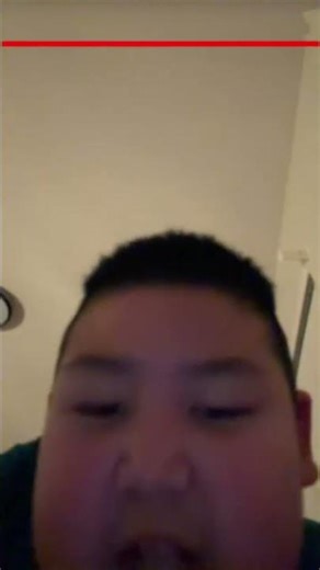 #DreamTrack Coco the cat wearing a black hat on a mat doing some math