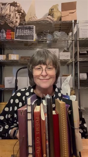 Good Postage on Instagram: "Julie’s 2026 Journaling Ecosystem! She has a lot of books going on! Here’s the line up: -Hobonichi Weeks in a Tragen cover. She is using this as her wallet, recording the weather, and writing down what she’s grateful for. -A Hobonichi Cover with a Midori Frame Notebook inside. In this notebook Julie is taking notes from all of her workshops. -Hobonichi Five Year Journal with the gorgeous red leather cover. This is Julies second 5 year journal, wow! Goals! She takes a 