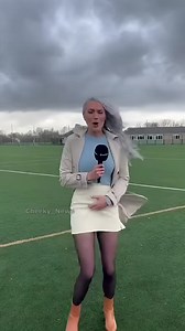 News Blooper: Microphone Nearly Blown Away by Wind