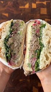 Slow-roasted lamb that pulls apart, creamy tzatziki, crisp red onion, and fresh greens—all stacked on toasted ciabatta 🥪 The ultimate lamb sandwich? We think so! 😋 | Australian Lamb