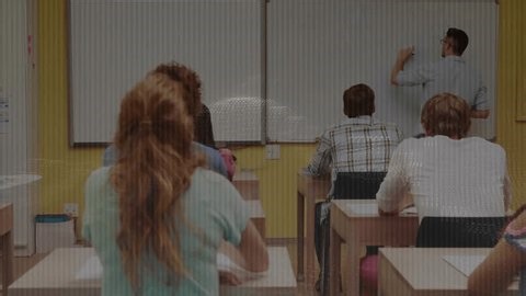 clip-3998888969-male-teacher-writing-binary-on-whiteboard-starting