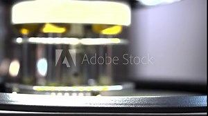 Rotating machine with steel pipes. HDR. Steel machine rotates with pressing tubes. Industrial Tablet Pressing Machine