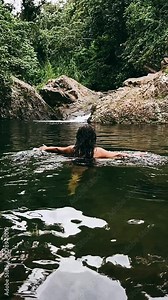 Slow Motion of woman in water, Slow motion, Woman swimming in swimming hole, Woman in slow motion in a swimming hole, Paradise, Beautiful woman swimming, Waterfalls in Puerto RIco