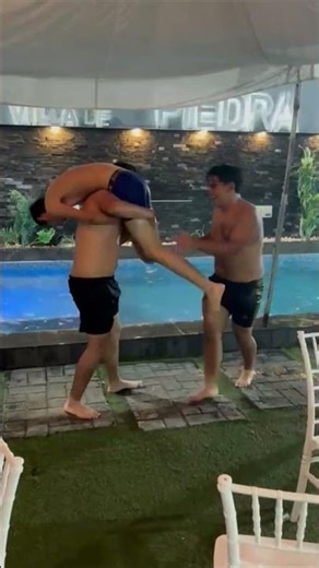 Friends Toss Each Other into a Swimming Pool During a Summer Party