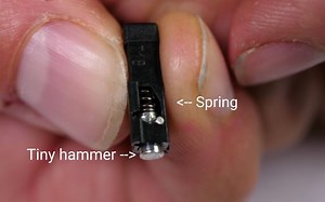 Piezoelectricity - why hitting crystals makes electricity