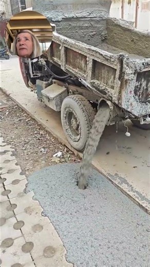 Pump Truck Pouring Out Cement (cr:tt/zillionusedpumptruck)