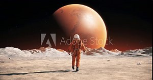 Male Astronaut In Space Suit Walking On Alien Planet. Planet Mars Is Visible. Space Related Slow Motion Majestic Scene.