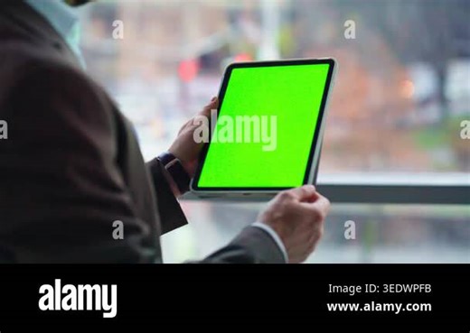 Businessman hands touching chroma key tablet standing in modern office closeup. Elegant manager using green screen computer for work tasks. Man ceo focused on reviewing data managing project digitally Stock Video Footage - Alamy