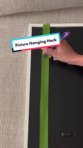 hang your picture where you want and level it at the same time🤯 thanks @livingwithley for this genius hack! #lifehack #diytiktok #homedecor #hacks