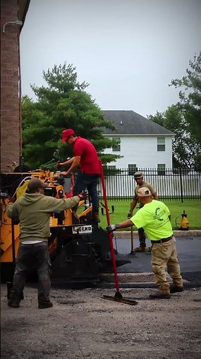 Crew Moving Steady on Asphalt Work