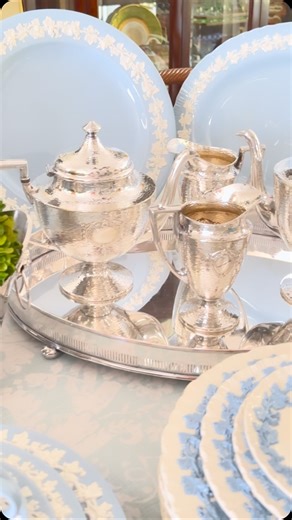 Timeless pieces! 🩵 dm to purchase Sheffield tea set Wedgwood dinner sets Bormioli Rocco glasses Oyster plates Double happiness ginger jars English Champagne bucket #tablesetting #tablescape #eventplanning #homedesign #instastyle #instadecor #interiordesign #interiordesigner #decor #housebeautiful #palmbeachchic #palmbeachinteriors #homestyling #interiorstyling #oysterplates #interiorstylist #interiors #elledecor #instahome #32963 #hamptonsstyle #palmbeachregency #coastal #coastaldecor #coastall