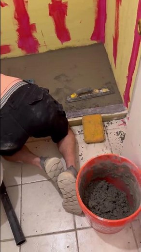 rebuilding shower by installing a new shower pan, Durock, standard wall tile, and grout.