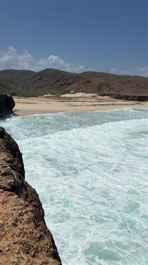 Most tourists in Aruba never see this side of the island 🇦🇼🌊 Hidden deep inside Arikok National Park, the waves at Dos Playa hit completely different. Not the calm resort beaches… This is Aruba’s raw Atlantic coast. Would you visit here? 🌊 ⸻ #aruba #arubatravel #arubabeach #arubanature #onehappyisland