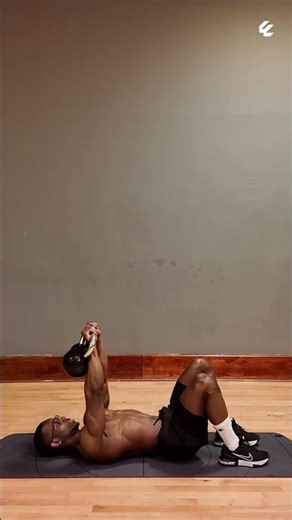 Kettlebell Floor Presses (Chest + Triceps + Stability)