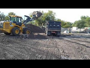 How to load a dump truck with a loader!!