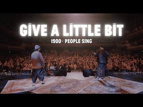 2000 Voice Choir! sings 'Give a Little Bit'