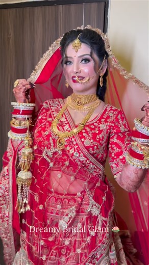 Ishika Jaiswal | Makeupartist on Instagram: "Red bride with bold red lips ❤️ She chose a divine goddess look — absolutely stunning and graceful ✨ So beautiful, so mesmerizing. Bridal bookings are open! If you’re looking to book your bridal day, hurry up — very limited dates available for February, March & April. 📞 6289859176 #viral #makeup #instagram #weddingseason #bridalmakeup"