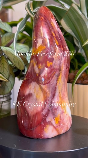 Mookite freeform standing nearly 6 inches tall and 3 1/2 inches wide. $80 Mookaite's meaning is deeply tied to its origin as an Australian Jasper, embodying themes of connection to Earth's ancient energies, grounding, and nurturing. Metaphysically, it is associated with promoting mental peace, acceptance of life's cycles, and personal empowerment. Found near Mooka Creek in Western Australia, this stone helps bring stability, clarity, and emotional balance. KE Crystal Community hosts live feeds e
