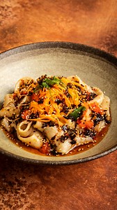 Craving noodles with a kick? 🔥 These homemade Biang Biang noodles are luxuriously chewy, tossed in smoky garlic chilli oil and topped with a zingy fermented lemon salsa. A fresh, vibrant dish that’s fun to make and even more fun to slurp. Tag a Biang Biang noodle fan in the comments 👏 Find the full recipe via the 🔗 in our bio! | Great British Chefs