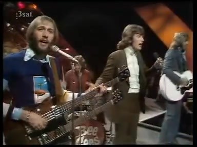 Video of Maurice Gibb playing his 1968 Gibson EBS-1250 double neck bass/electric guitar at the Top of the Pops performance of 'My World' in London 1972. Australia's Geoff Bridgford on drums. | Bee Gees Fan Club Australia