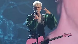 Watch Machine Gun Kelly Prove He's a Madman By Climbing A Dangerously High Concert Venue Mid-Song