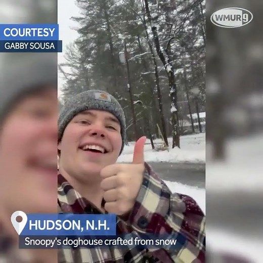Snoopy's doghouse sculpted with snow during nor'easter in New Hampshire