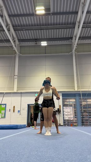 Acrobatic Gymnastics Duo: Stunning Indoor Performance