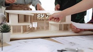 Interior designer drafting blueprint with customer supervise and oversee interior designer draw house room layout on home based on client demand. Architectural customer service. Burgeoning