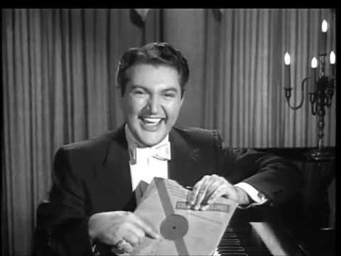 Liberace plays "The 12th Street Rag" with the Liberace Puppet (1950's)