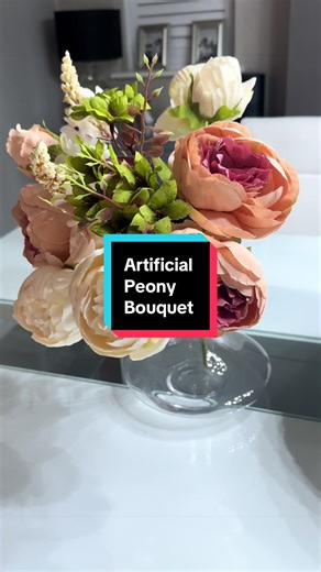 This is a beautiful cost effective way to brighten up your home for spring! #tiktokmademebuyit #artificalflowers #springtime #homedecor #homehacks