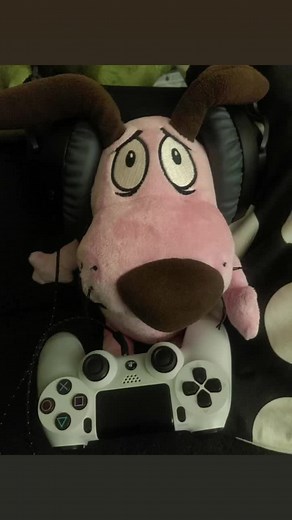 Cartoonish Dog Plush Toy with PlayStation Controller
