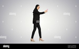 Young pretty muslim woman in hijab having video call on her phon Stock Photo - Alamy