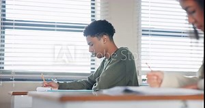 Answer, exam and thinking with student in classroom of school for assessment, problem solving or university test. Education, solution and question with teen boy in class for development or growth