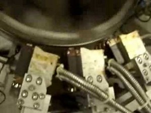 Nordson Roll Fed Labeling e dot+ Hot Melt Gun Nordson On Krones Contiroll Carousel system