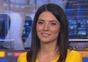 Who is Natalie Sawyer dating and what football team does she support?