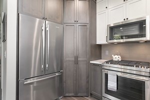 Have a corner pantry? Get rid of the door and blend it into the cabinetry to create a hidden pantry. | Mountainwood Homes
