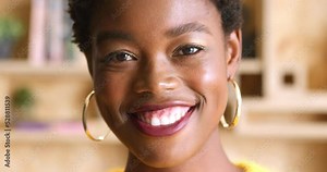 Smile, confidence and face of young black woman with happy, proud and empowerment expression. Portrait, beauty and motivation with african american female and healthy dental teeth smiling