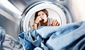 Mrs Hinch demonstrates how to clean washing machine draw