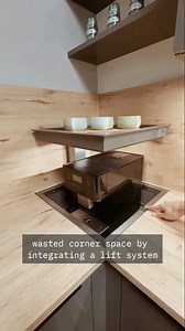 This kitchen corner isn’t wasted anymore 👀 A hidden lift reveals the appliance when needed — and vanishes when not. Smart storage. Clean design. Modern living. #SmartKitchen #KitchenInnovation #SpaceSavingDesign #HiddenStorage | Aluminium Glass Design