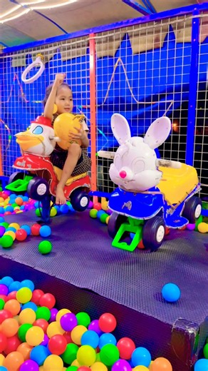 Sitting on Donald duck and white rabbit swaying while catching the yellow ball exciting #cocomelon