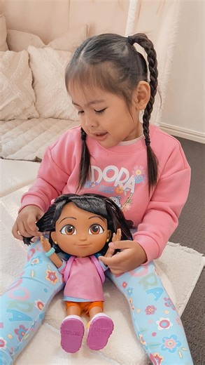 Amira Kelsie | ✨ DORA is here! ✨ Our little explorer couldn’t be more excited about the brand-new Dora range 🧭🎒 From singing dolls to the cutest outfit,... | Instagram