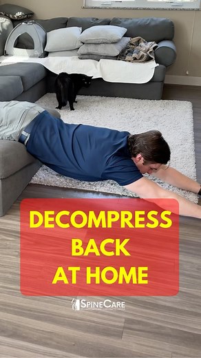Dr. Michael Rowe | SpineCare on Instagram: "👉 Dr. Rowe shows how to decompress your back at home. This spinal decompression exercise is geared towards relieving pressure in the spinal discs of the upper, middle, and lower back. How it works is through a pulling motion, or TRACTION. Think of a very good stretch that helps open up the spine. This is effective in many ways, such as helping to decrease muscle and joint stiffness and taking pressure off pinched nerves (that may be causing sha